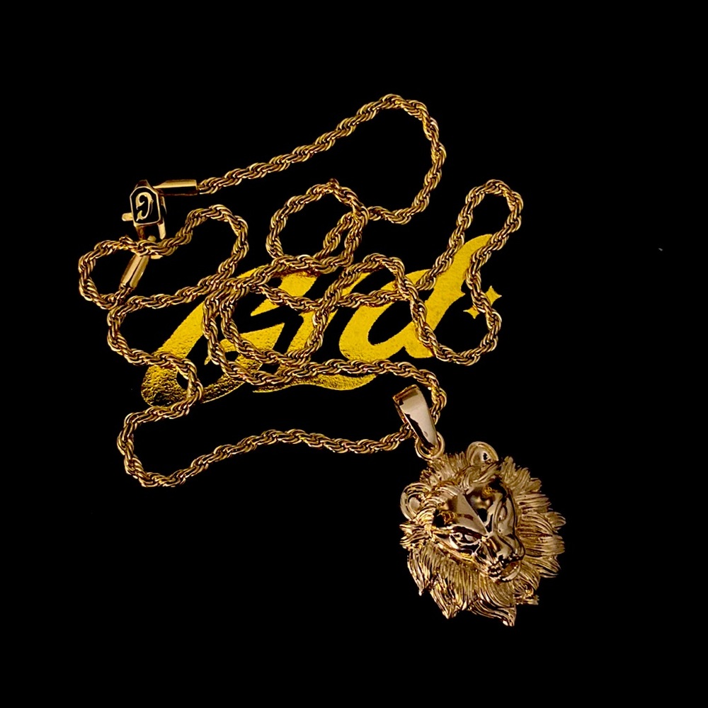 Gold chain with lion pendant